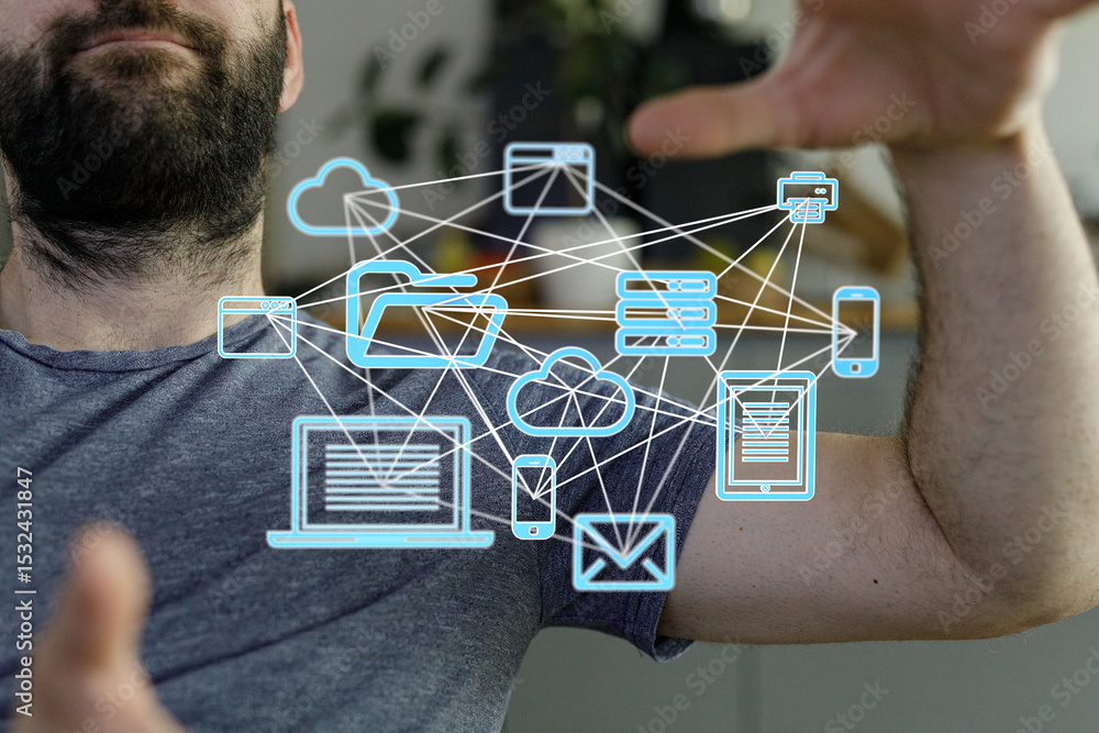 Aufkleber Stock photo of a man visualizing a network of interconnected devices and cloud storage, representing data flow and connectivity.