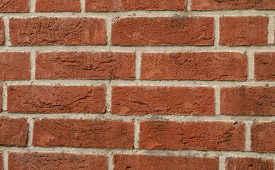 High-resolution image of a red brick wall, perfect for backgrounds or textures.  Ideal for construction, architecture, and design projects.