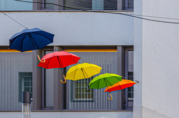 colorful umbrellas in the rain