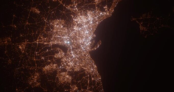 Aarhus (Denmark) aerial view at night. Satellite view on modern city with street lights. Camera is flying above the city, moving forward