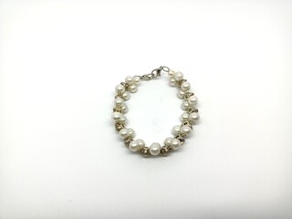 bracelet with white pearl variations isolated on white background