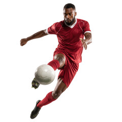 A soccer player in a red uniform kicking a white soccer ball with a transparent background in a studio shot