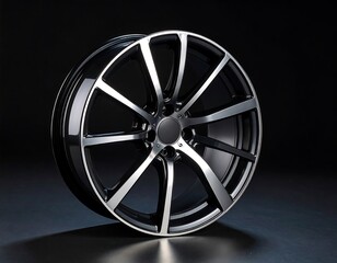 Fototapeta premium Sleek black and silver car wheel