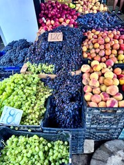 Close-up of fruit on a market stall in a street in Tirana, Albania, on a summer day
