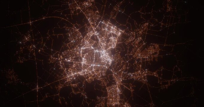 Gomel (Belarus) aerial view at night. View on modern city from space. Camera is zooming in, rotating counterclockwise