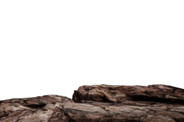A low-angle, close-up shot of a rugged, dark-brown rock formation against a pure. The rocks are textured, showing varied shades and subtle crevices. 