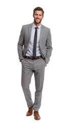 A man in a light gray suit with a dark gray tie and brown leather shoes standing and smiling at the camera