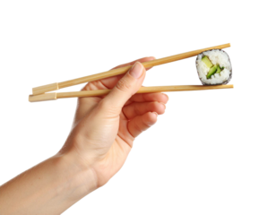 sushi roll held with chopsticks in hand isolated on transparent background