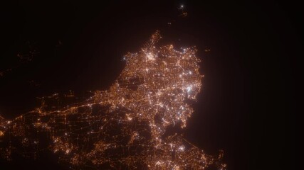 Victoria (Canada) aerial view at night. Top view on modern city with street lights. Camera is zooming out, rotating counterclockwise. Vertical video. The north is on the left side - Powered by Adobe