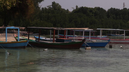 Fototapeta premium Wooden fishing boat on the beach