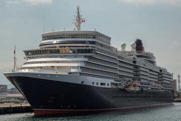 Classic ocean liner cruiseship cruise ship Elizabeth in port of Aomori, Japan with skyscraper...