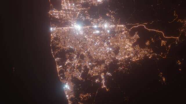 Tijuana (Mexico) aerial view at night. Top view on modern city with street lights. Camera is zooming out, rotating clockwise