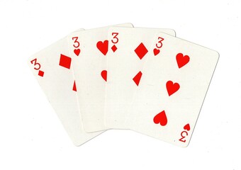 A hand of four red playing cards of the same value isolated on a white background.