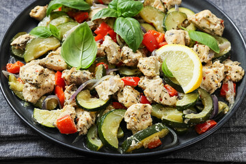 baked italian chicken and vegetables on a plate