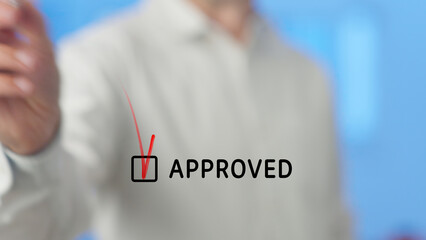 Businessman drawing a vibrant red check mark on a virtual checklist, representing project approval and the successful completion of important tasks in a digital environment