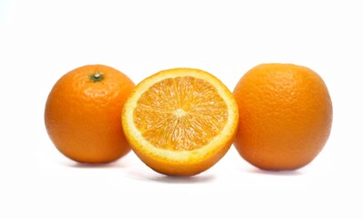 Orange fruit on white background, beautiful texture, high vitamin c fruit concept.