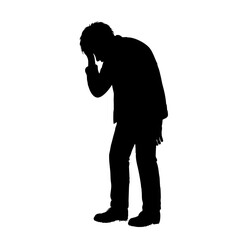 Man silhouette holding head in hands, feeling stressed and overwhelmed. Depressed person silhouette shows sadness and despair.