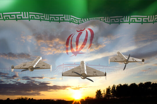 Combat drones against the sunset with Iran flag