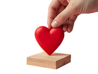 Fototapeta premium Elevated Heart Display: A hand delicately positions a vibrant red heart atop a wooden pedestal, embodying the essence of love, care, and devotion. This symbolic image.