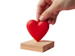 Elevated Heart Display: A hand delicately positions a vibrant red heart atop a wooden pedestal, embodying the essence of love, care, and devotion. This symbolic image.