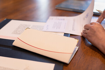 The bride signs the marriage registration documents