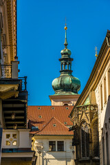 A view down a side street beside the Powder Tower  in central Prague in springtime
