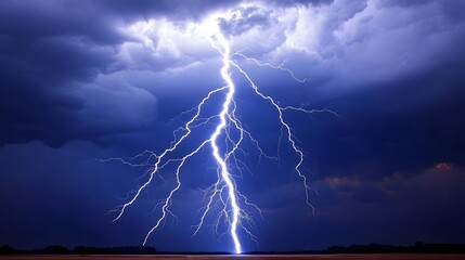 Powerful lightning bolt striking dark clouds.