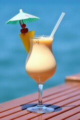 Tropical Dream: A refreshing, inviting glass of tropical cocktail with pineapple, cherry garnish, and a miniature umbrella against a soft blue ocean backdrop.