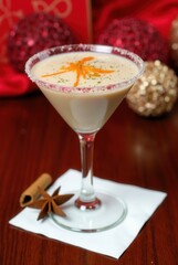 Festive cocktail: A sophisticated cocktail with a sugar-rimmed glass, garnished with an orange twist, offering a delightful taste experience with its rich.