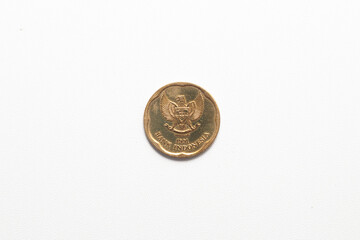 A close-up shot of an Indonesian 500 Rupiah coin from 1991, featuring the Garuda Pancasila emblem, centered on a plain white background.