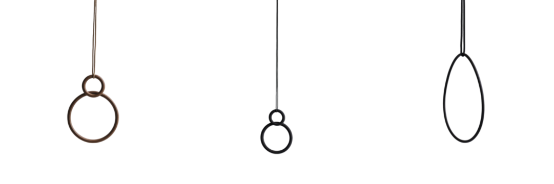 Hanging loops in various shapes and sizes isolated on a transparent background featuring three distinct designs suspended from thin strings