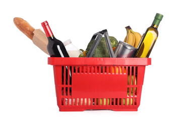 Shopping basket with different food products isolated on white