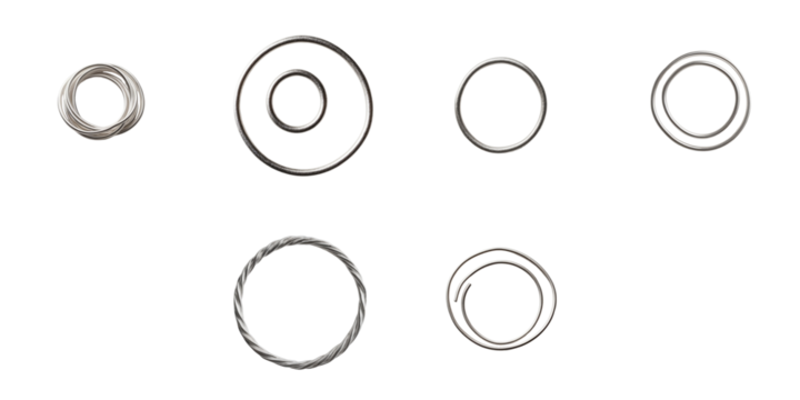 Various silver metallic loops displayed on a transparent background featuring different sizes and twisted designs emphasizing texture and shine