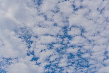 Beautiful scene of cirrocumulus clouds drifting across the sky in the winter season.