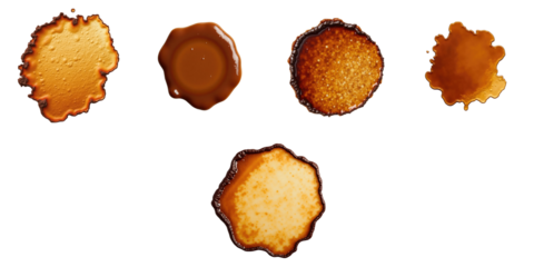 Assorted dried coffee stains isolated on transparent background showcasing various shapes and textures from top view, capturing unique natural patterns and colors