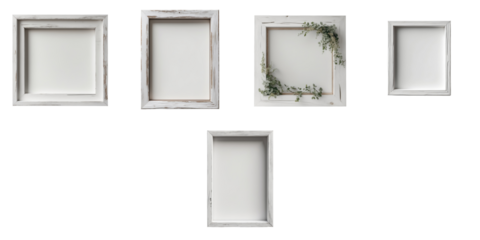Set of five variously shaped rustic wooden frames with white finishes on a transparent background, featuring one frame with greenery accents and blank inner spaces.
