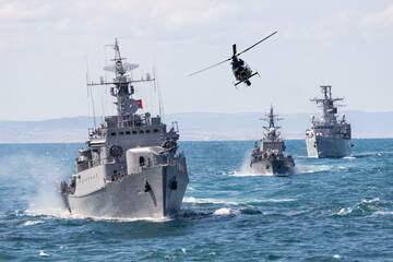A group of patrol warships accompanied by a helicopter are carrying out a peacekeeping mission in the Black Sea. 