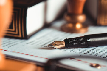 . Fountain pen on agreement in attorney office