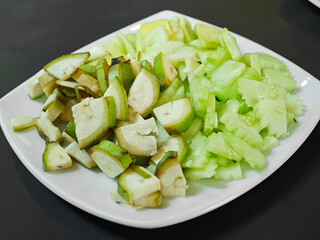 Raw green banana and fresh cucumber.