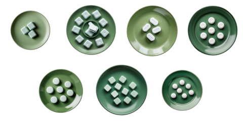Collection of green plates displaying various dishwasher detergent tablets arranged in different patterns with a transparent background isolated on transparent surface.
