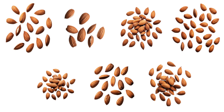Collection of dried almonds arranged in various patterns on a transparent background featuring different shapes and sizes showing texture and detail of the nuts