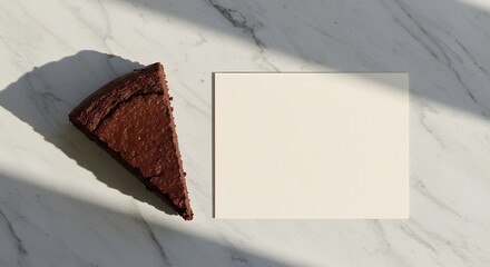 Flat lay of cake slice on marble table with blank thank-you card, elegant branding composition