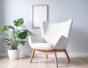 modern living room with sofa, armchair and a frame on background wall and plant in the room.