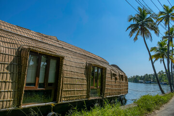 India tourism - Houseboat in Kerala backwater sailing through the canals in Alleppey