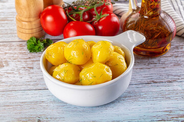 Boiled young potato with oil