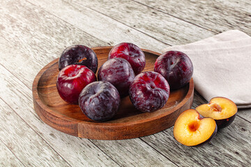 Ripe sweet juicy plum heap