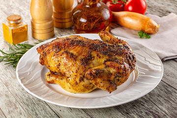 Baked in oven whole chicken with spices