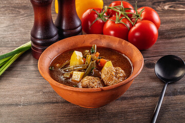 Tomato Soup with meatballs and vegetables