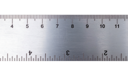 Close-up of a metal ruler showing measurements in inches with clear, black numbering and markings.