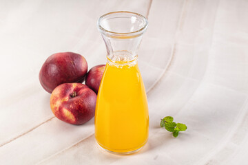 Vitamin beverage - peach juice glass